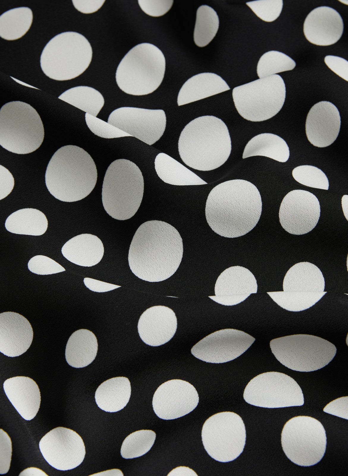 Women Sleeveless Polka Dot Blouse Black & White | Melanie Lyne