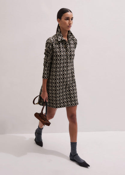 ME+EM ME+EM's Navy Graphic Jacquard Short A-Line Dress is crafted from soft jersey in a graphic blend of colors. Shop now.