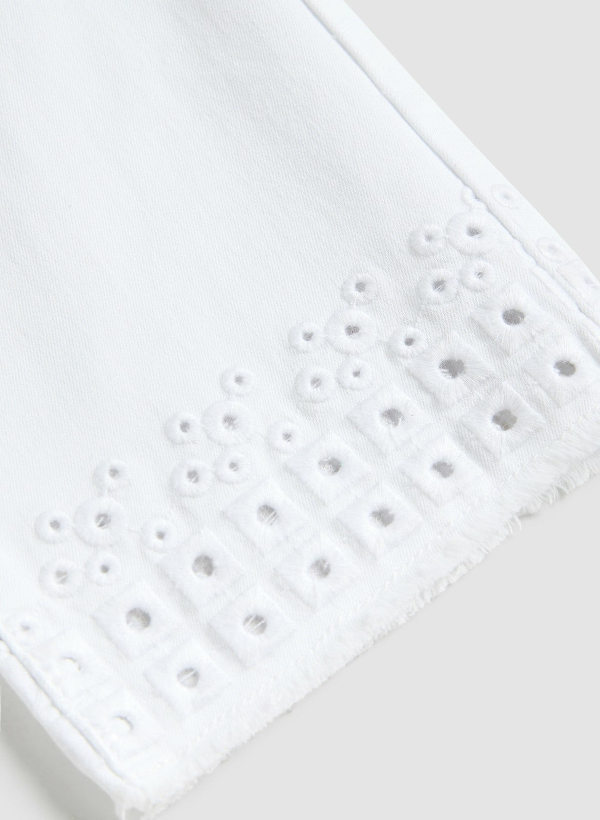 Women Eyelet Hem Denim Capris White | Melanie Lyne